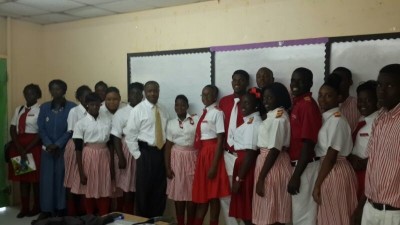 BISX CEO, Keith Davies with Grade 12 Students of the R.M. Bailey Senior High School